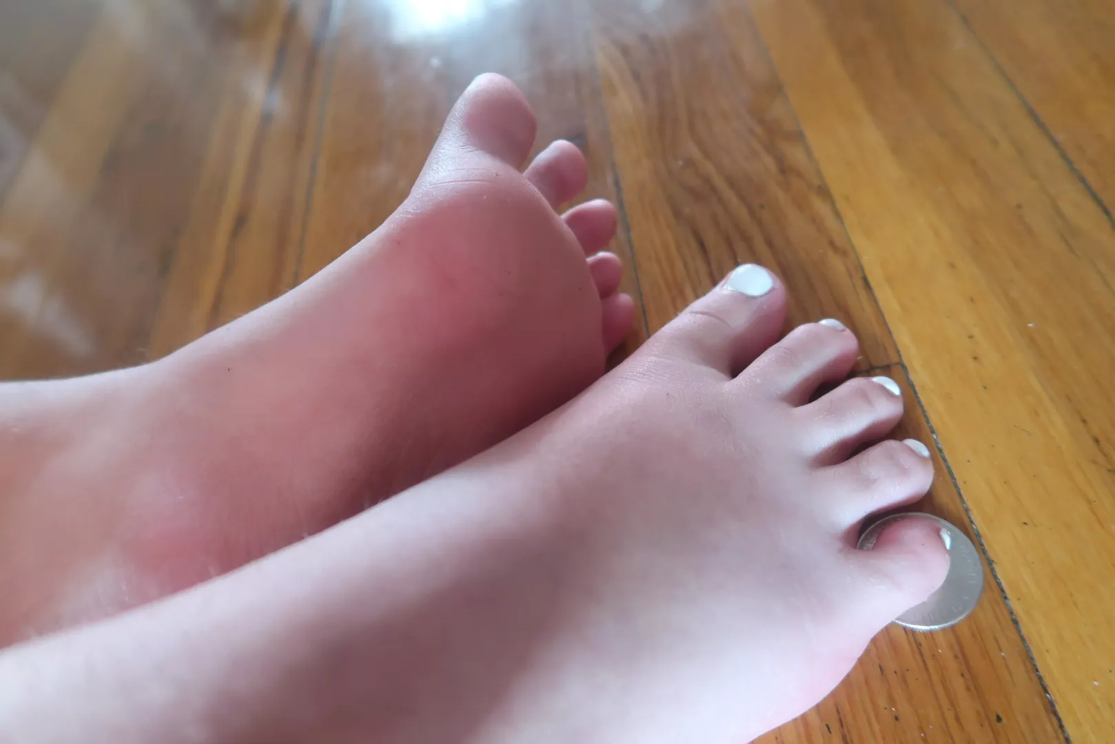 23 F, but with the smallest feet around :) Quarter for size comparison