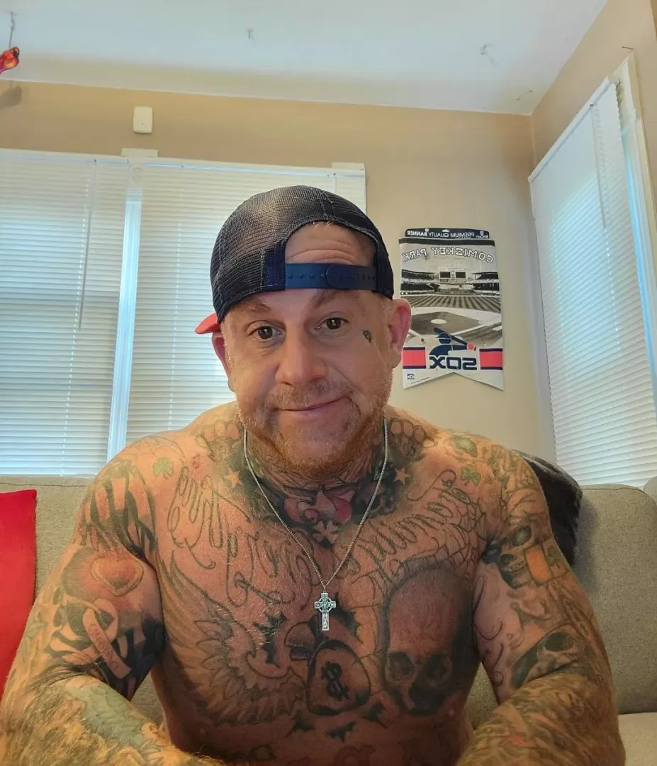 47 M Tattooed neck to waist.