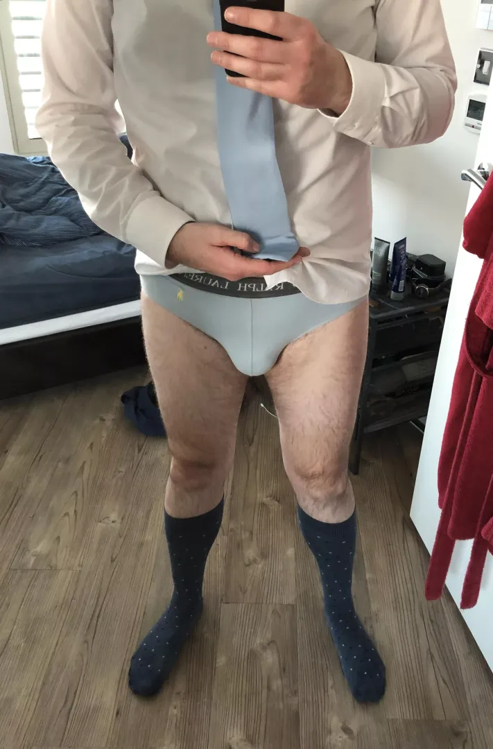 A couple of weeks ago, I posted a picture wearing polka-dot briefs, and I mentioned that I had matching OTC socks. Today, I wore the polka-dot socks but not the matching briefs. Went for a nice shade of blue instead.