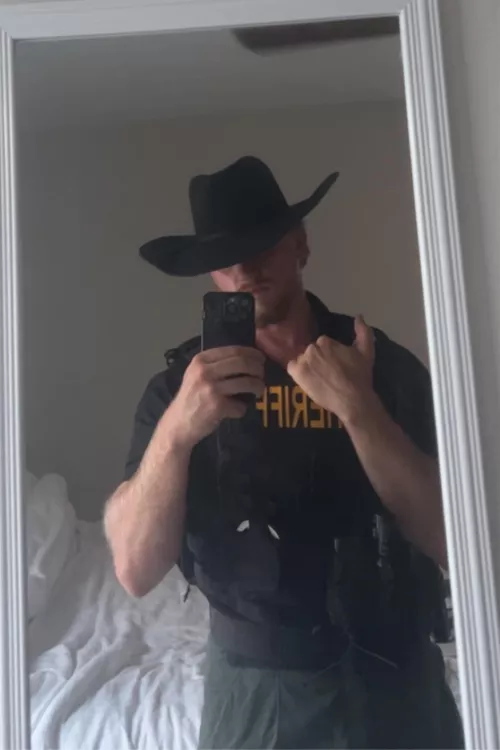 A cowboy hat really makes me wanna fuck at work