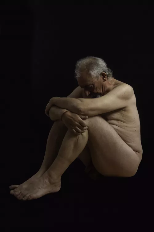 Alone (male seated)