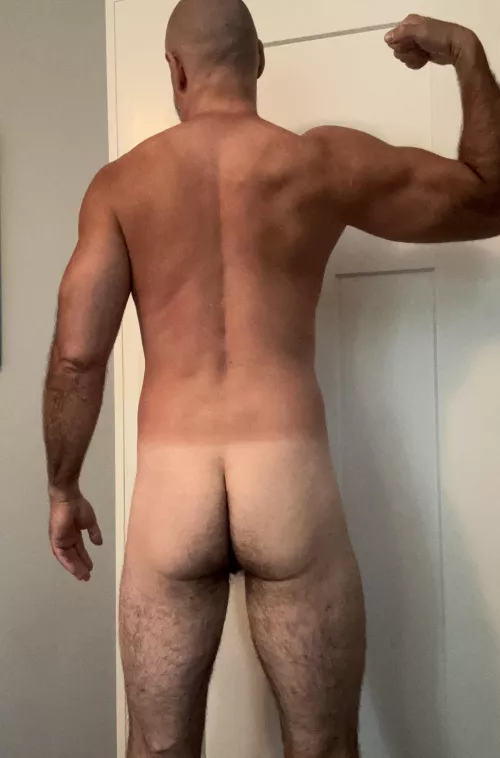 Behind 