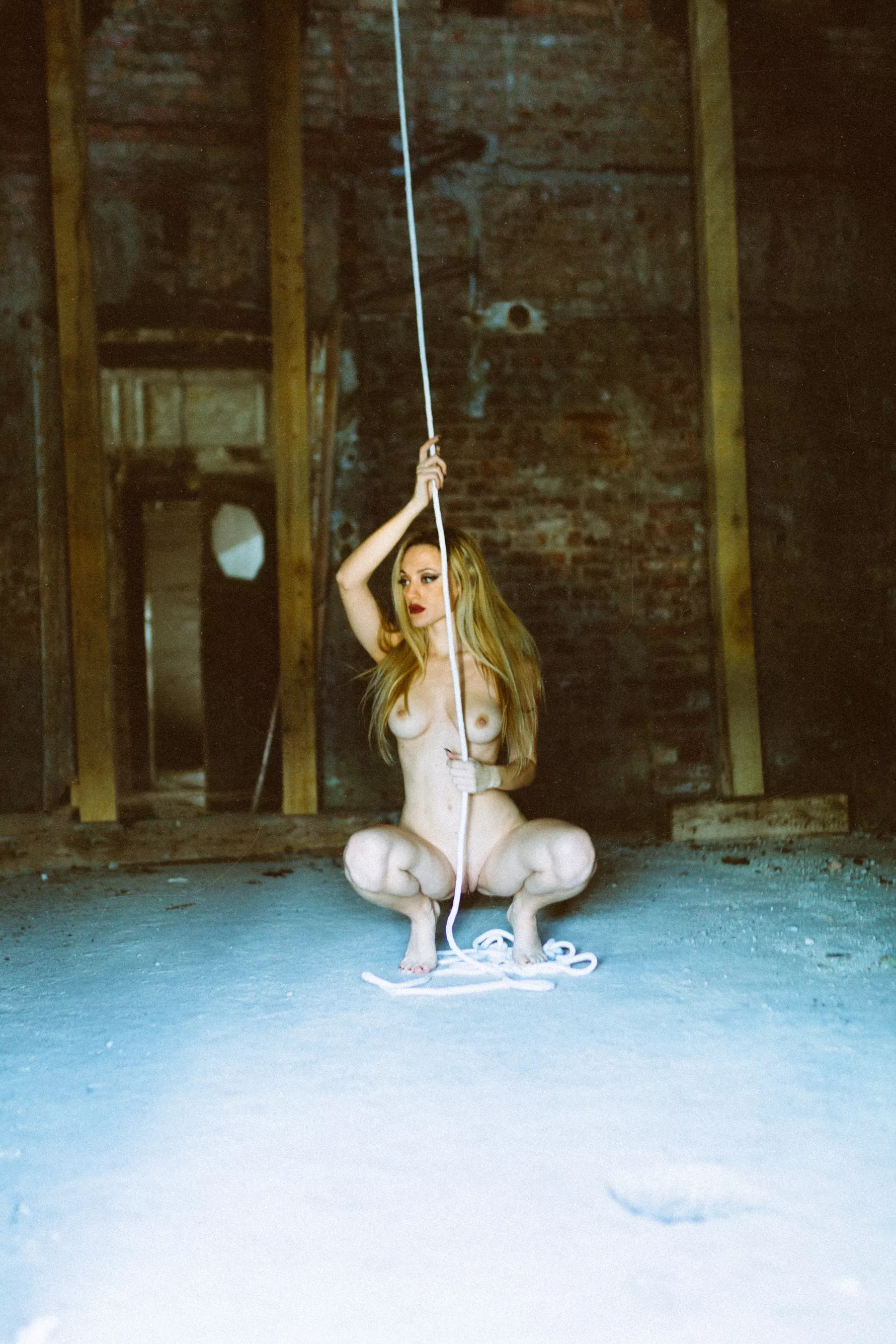 Behind rope...
