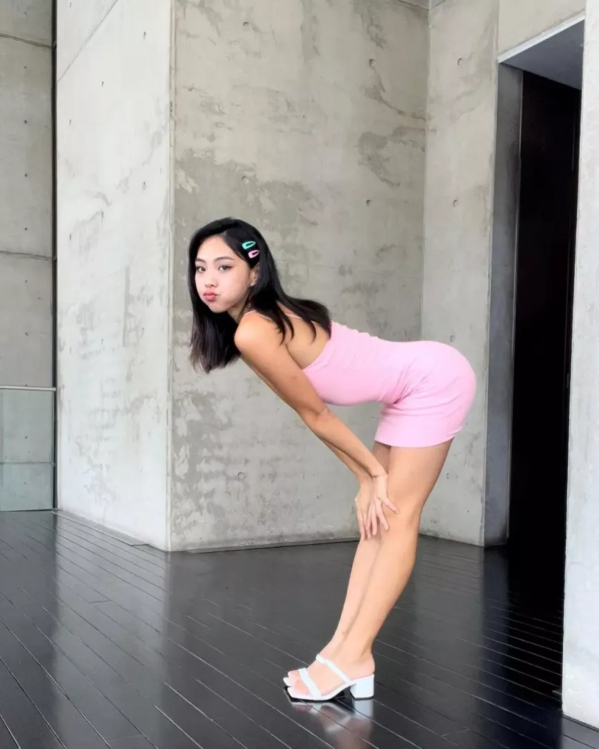 Bent over in a tight dress