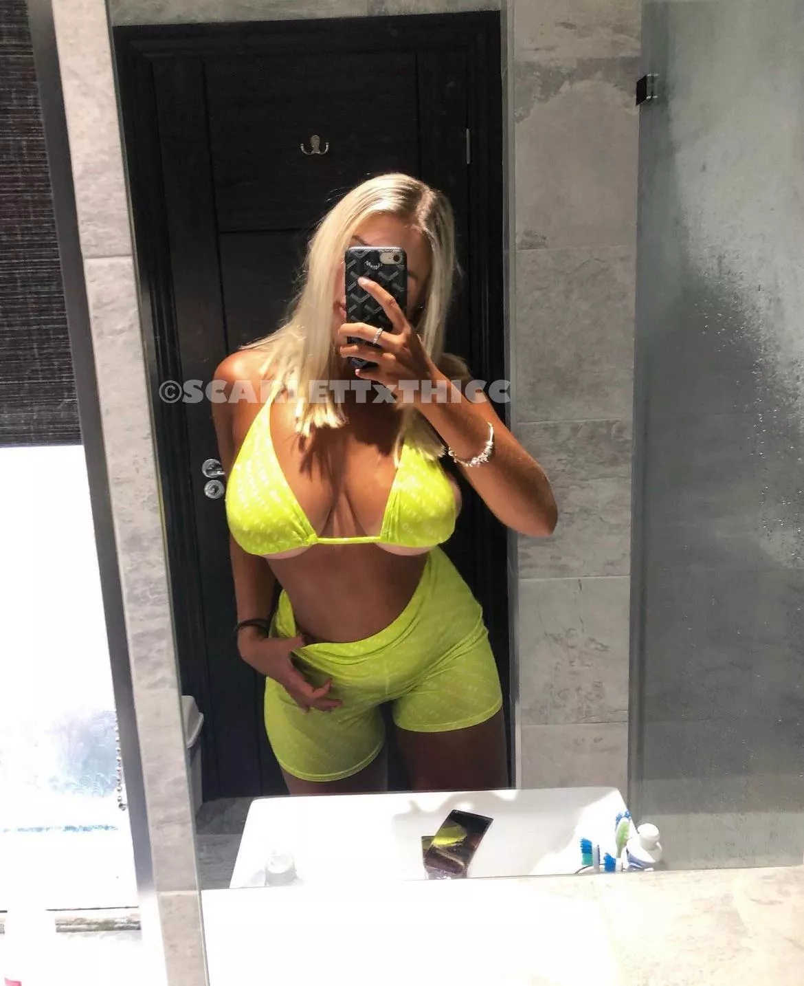 Big boobs in a bright bikini