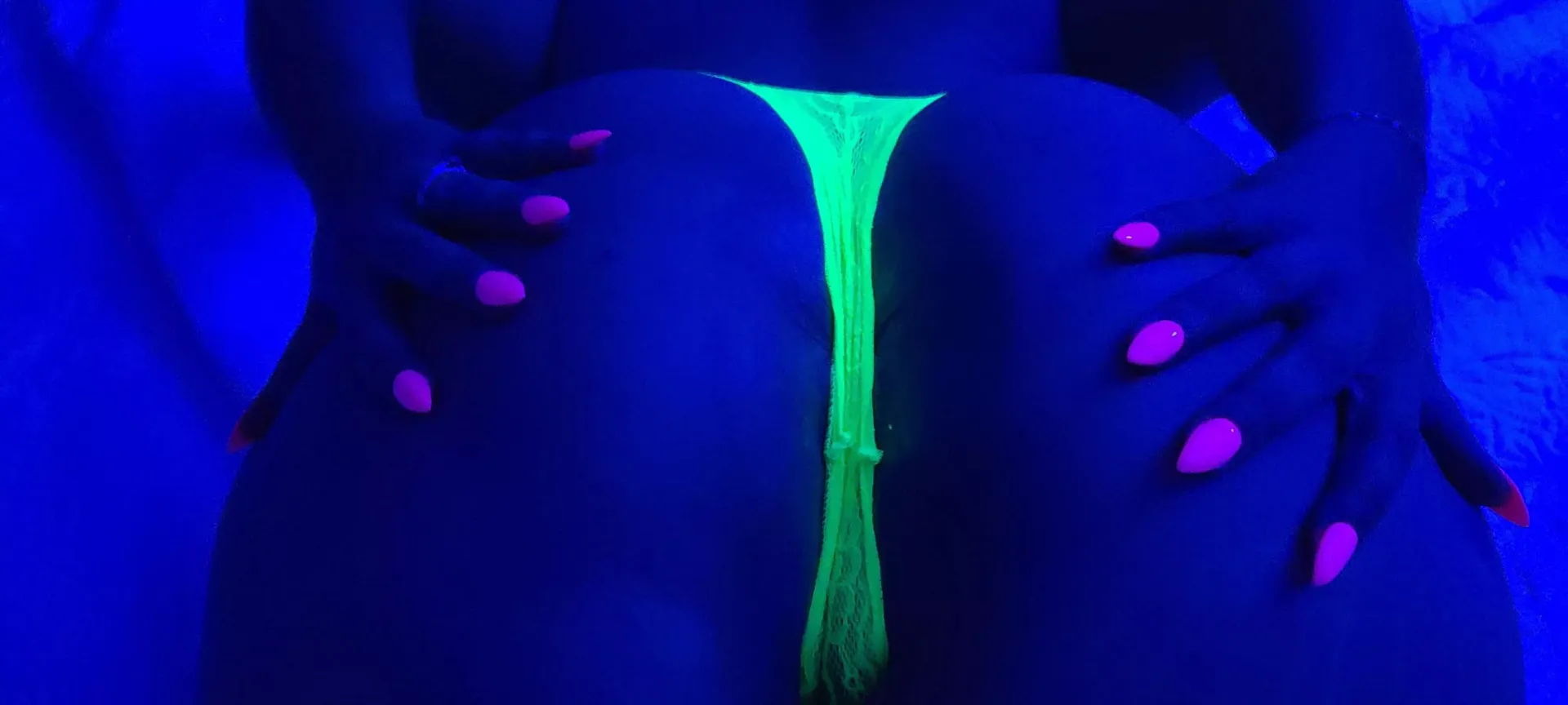 Black light, neon colors, and an asshole.