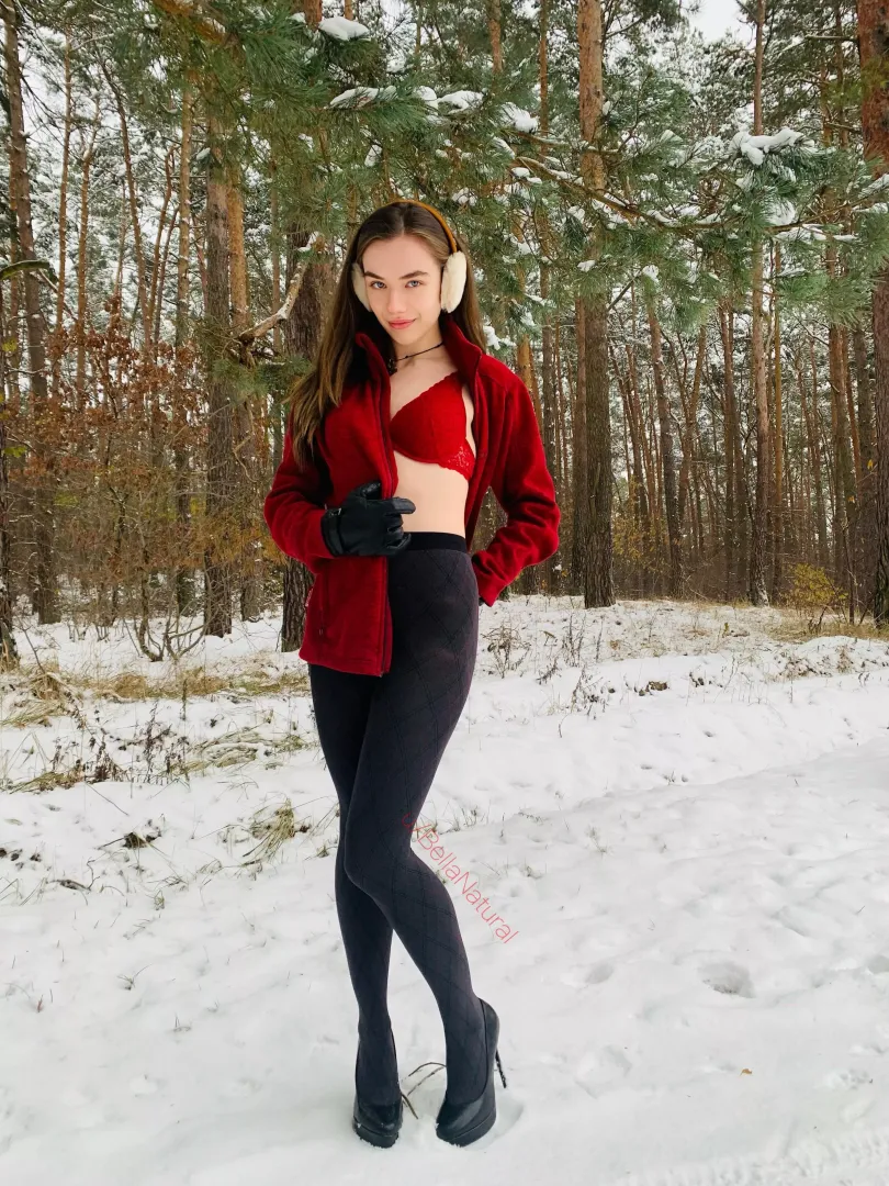 Black super high heels in snow