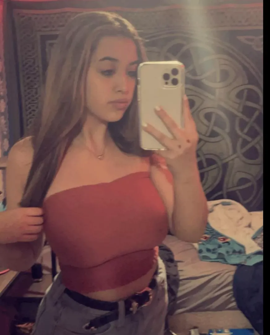 Busty in orange 