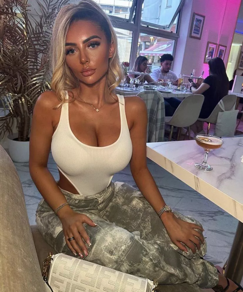 Busty tanned slut