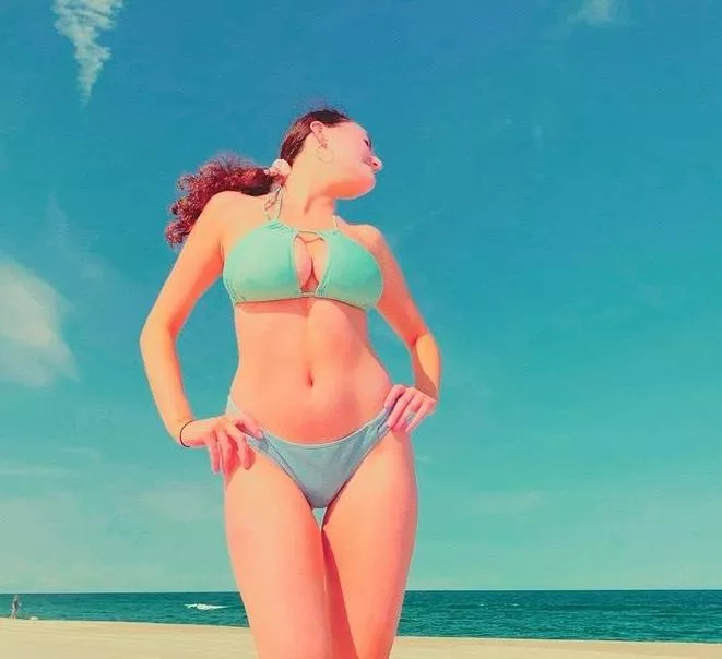 Busy beach babe