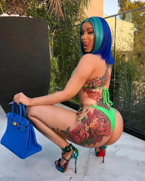 Cardi is built to worship all day and night