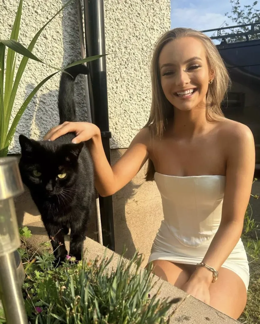Catherine stroking her pussy