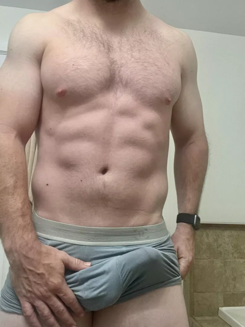 Dad woke up like this. Bulge stretching out his briefs.