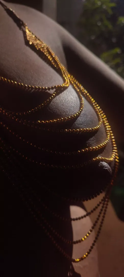 Dark nipple basking in the sun's glory..