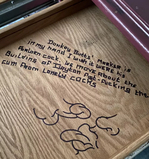 Desk drawer art in an abandoned building
