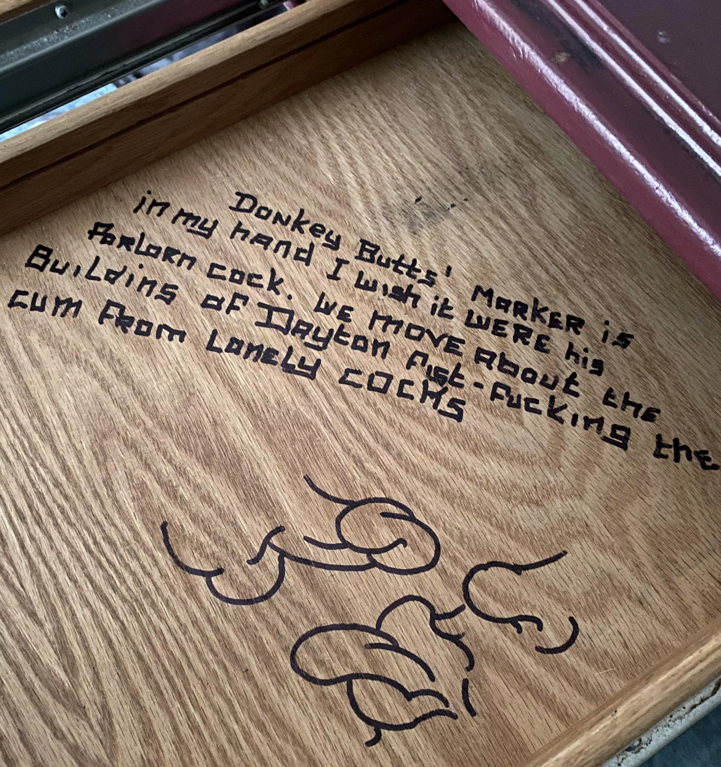 Desk drawer art in an abandoned building