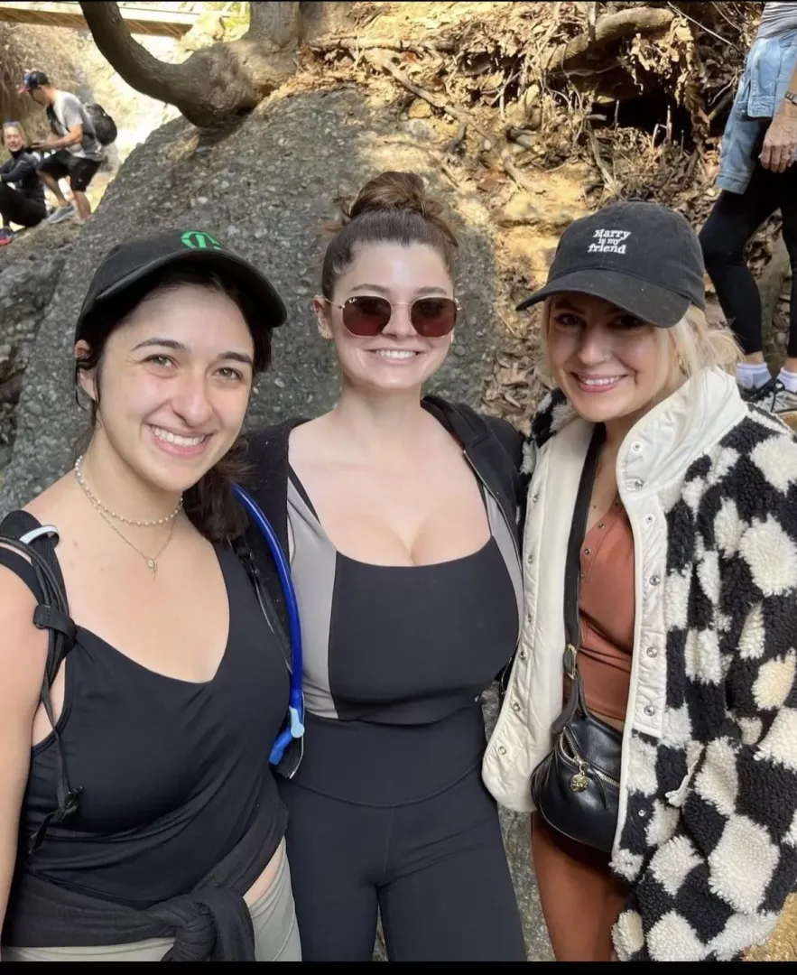 Dwarfing her friends