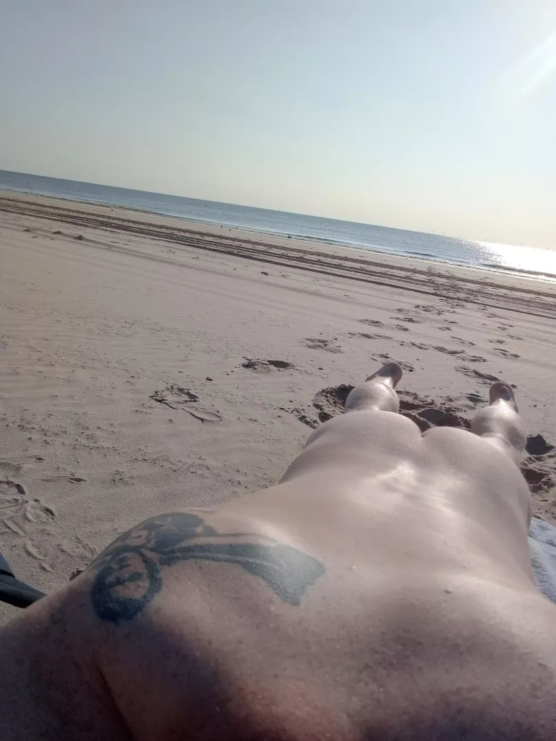 Evening sun on nudebeach; water calm & refreshing