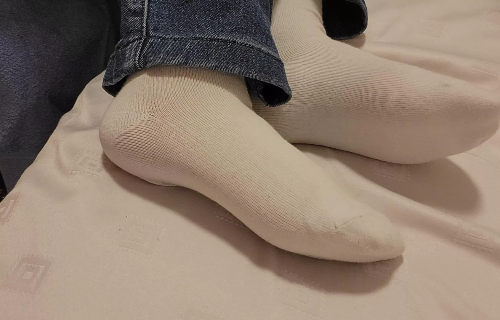 [female] jeans and white socks the classic combo