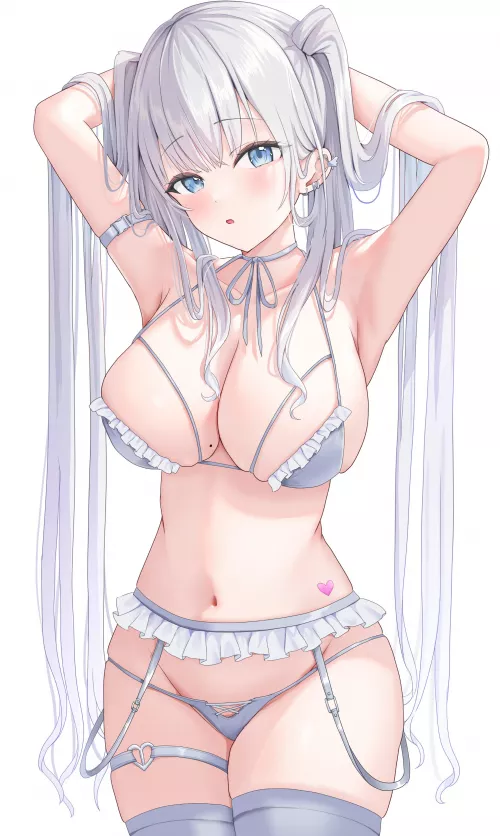 Fixing up her hair