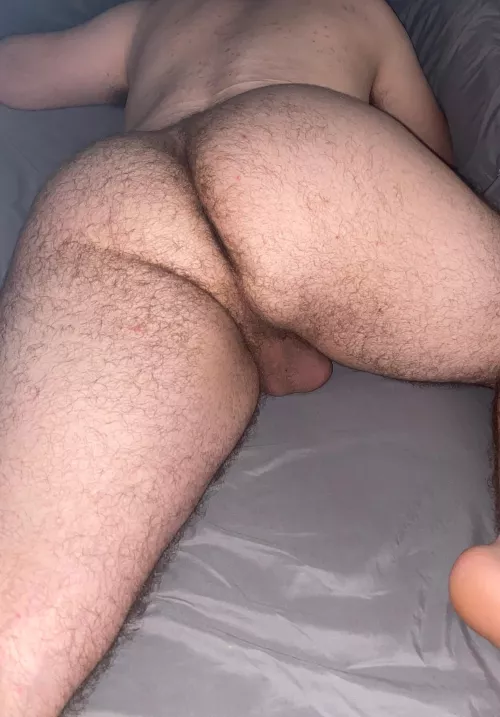 From behind