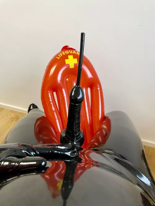 Fully wrapped in latex and enjoying the feeling