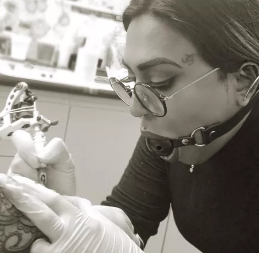Gagged tattooist 
