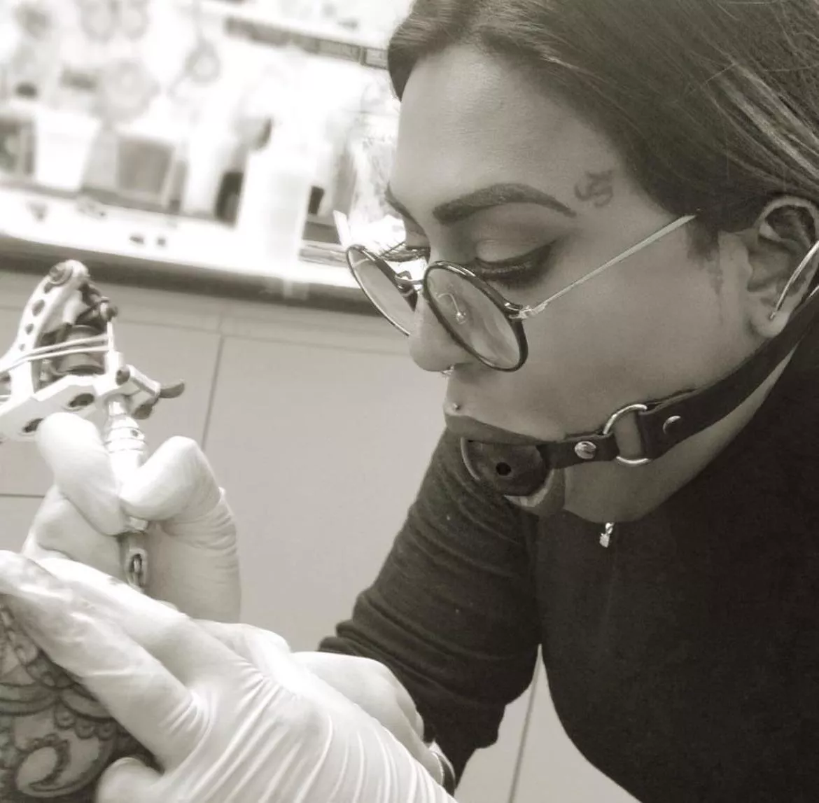 Gagged tattooist 