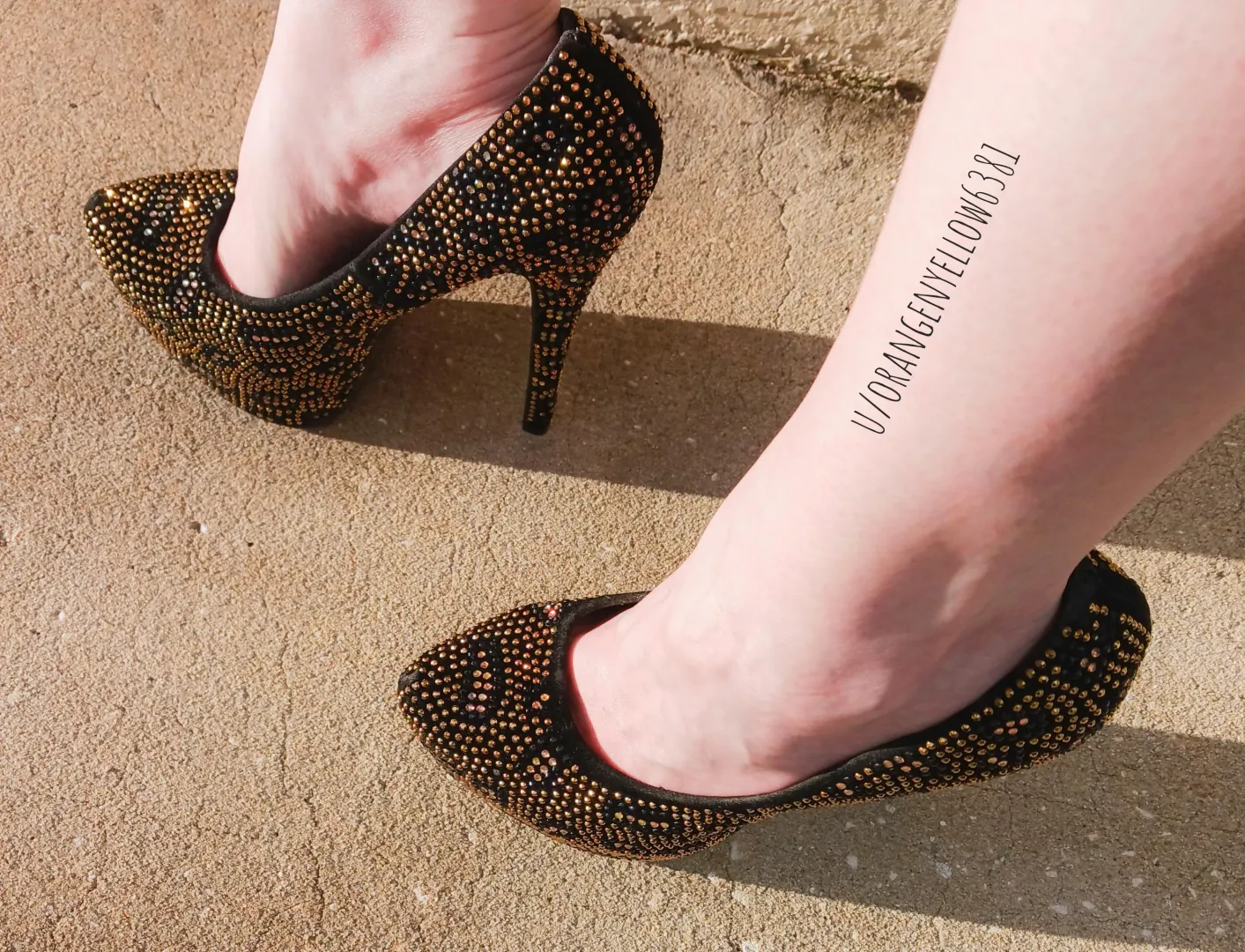 Gold and black rhinestone heels
