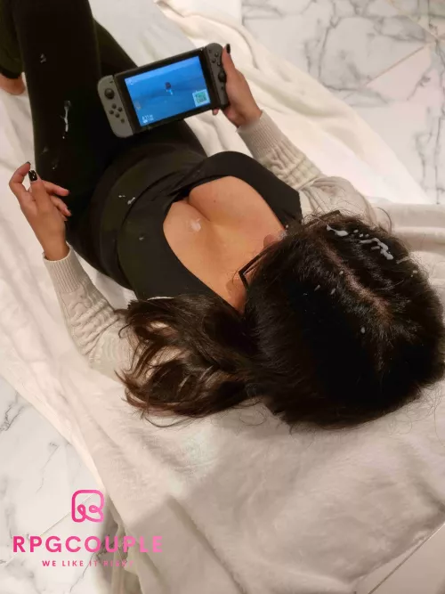 He shoots his load all over me while playing Nintendo