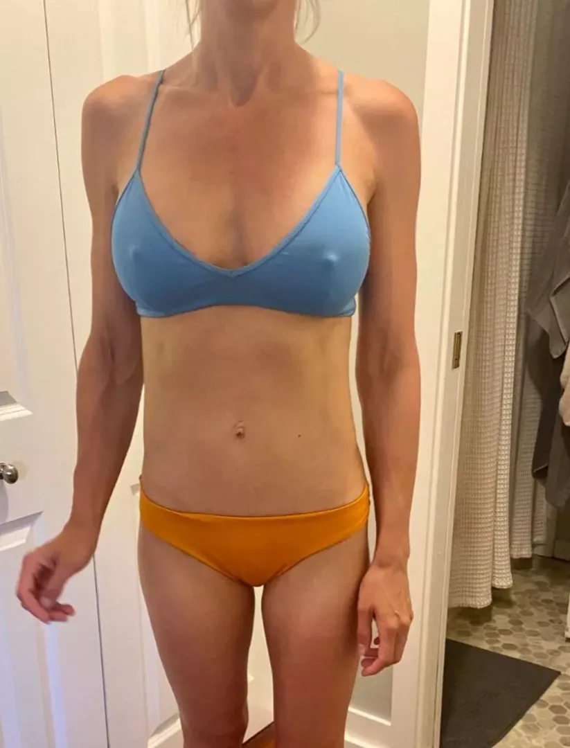 her sports bra never conceals her pokies. I often wonder how many looks she gets at the gym
