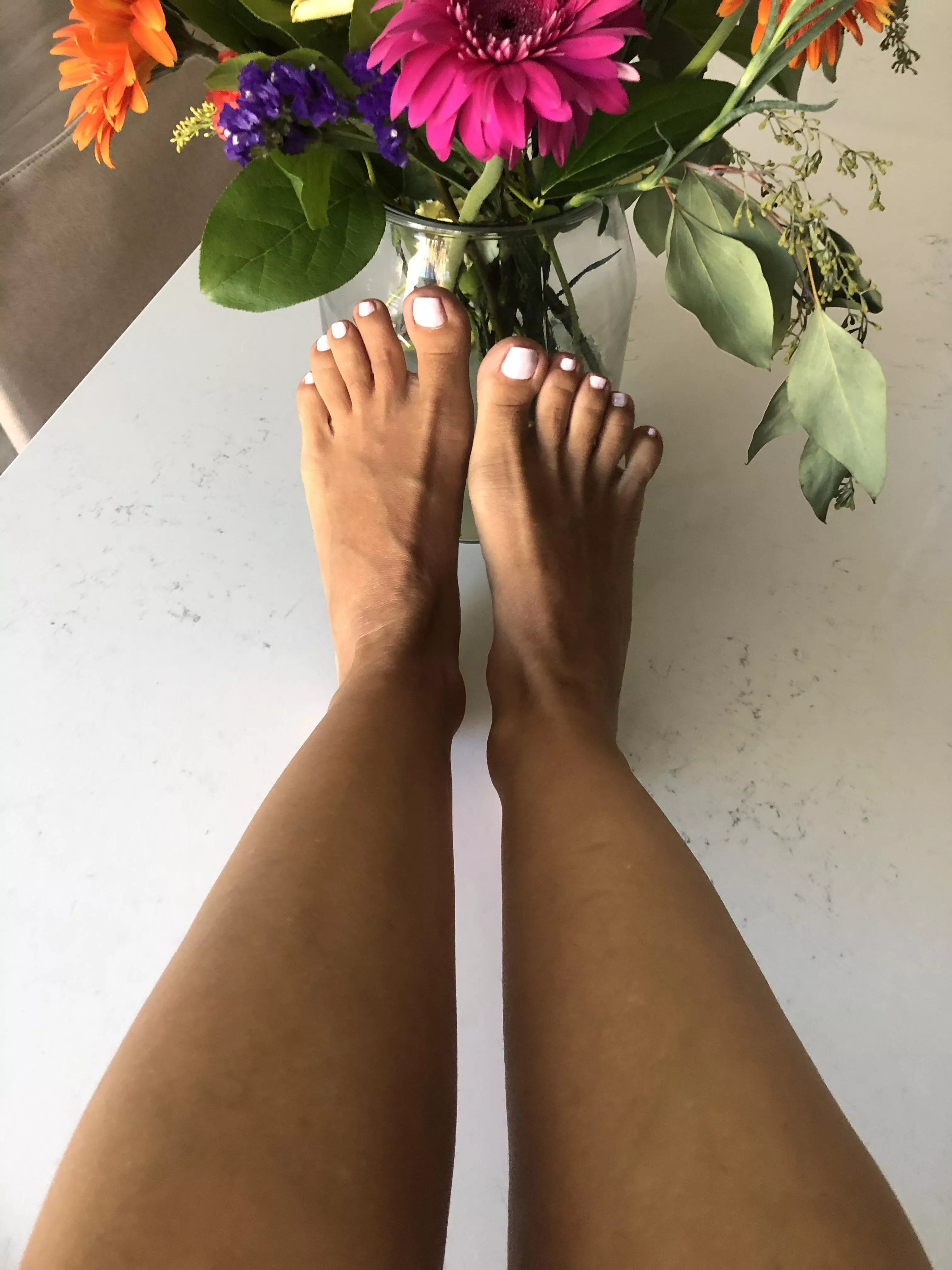 How about wishing foot lovers a happy birthday this way? With flowers and my feet?