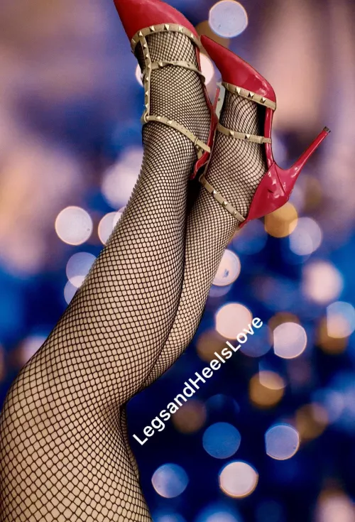 I think these red fuck me heels go nicely with these black fishnets.