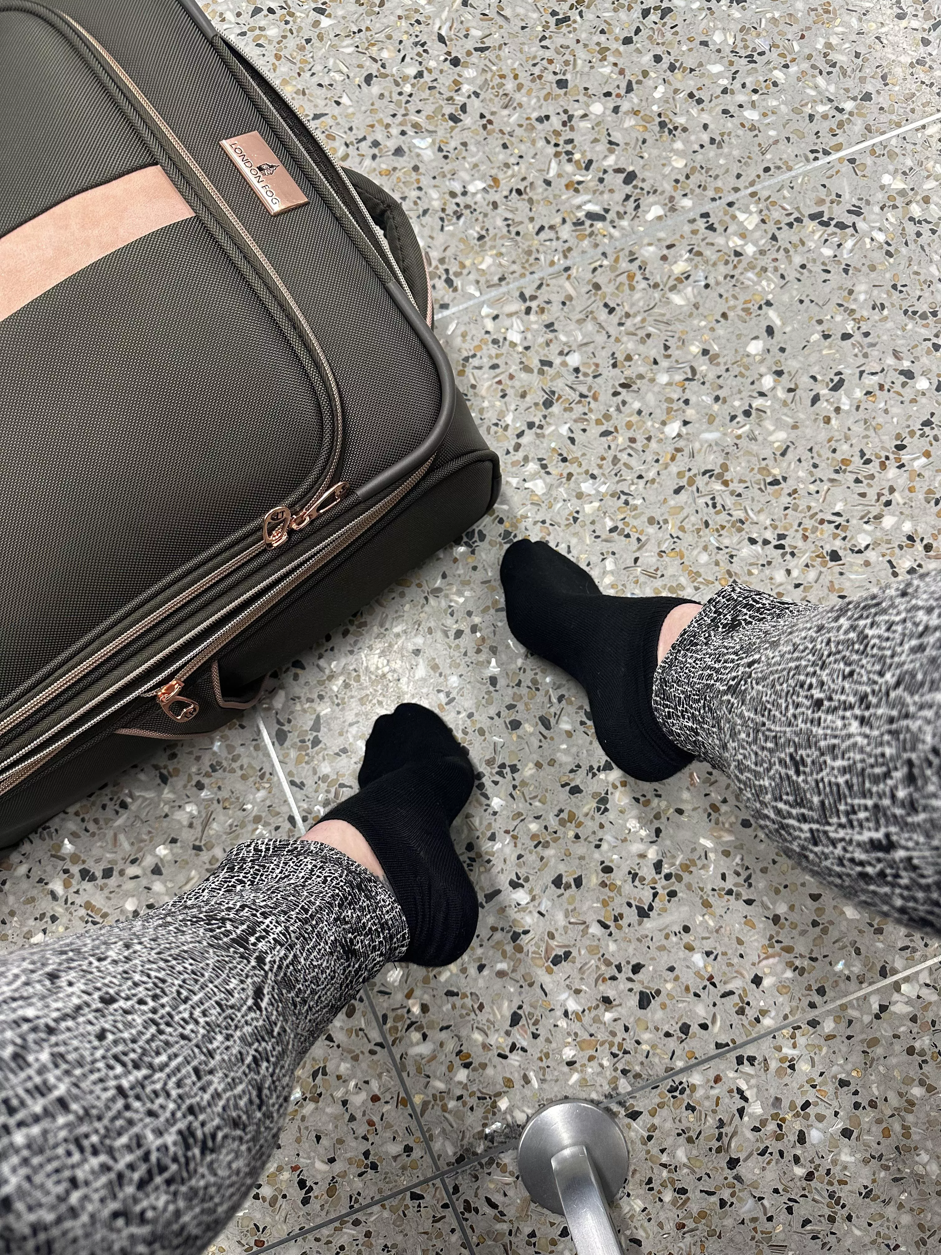 I wonder if my TSA checkpoint is into socks… it took a hot minute to get my shoes back