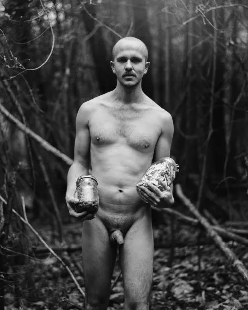 In the woods with my jarred, foraged mushrooms