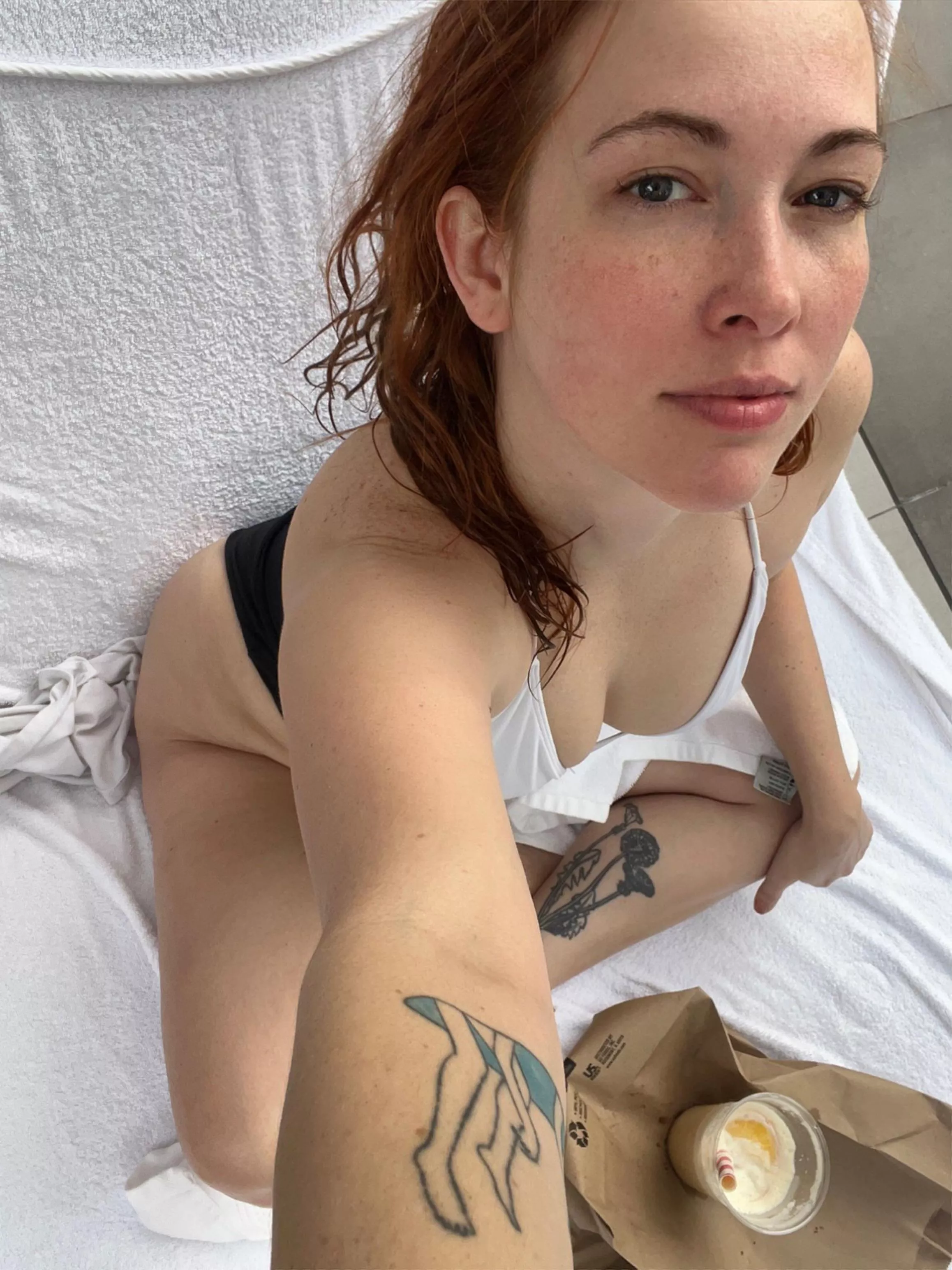 Just a girl covered in freckles and tattoos
