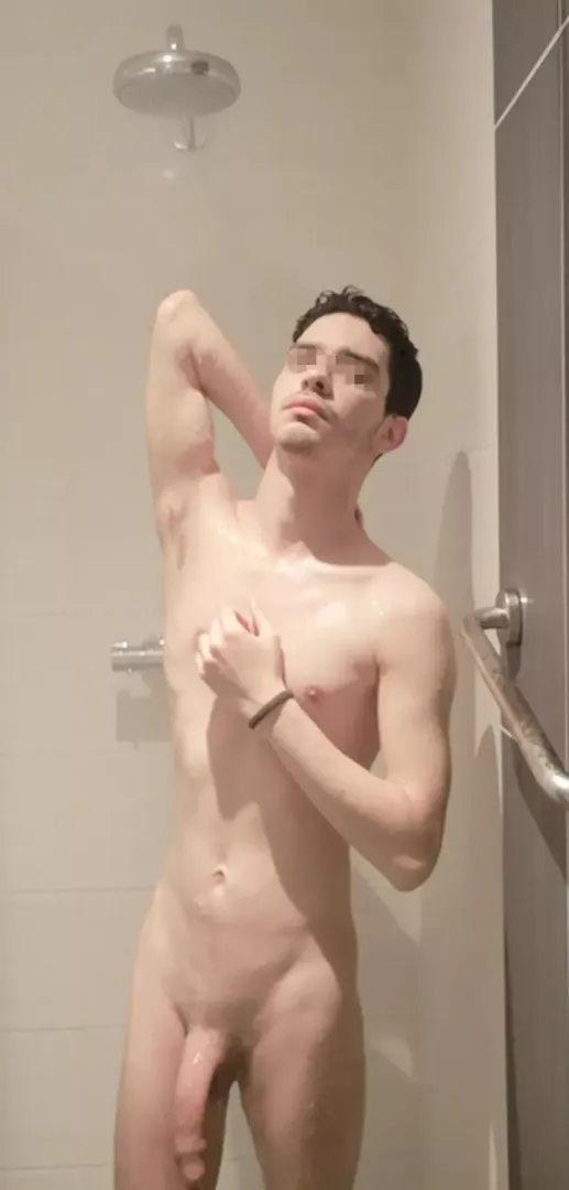 just a skinny guy having a shower