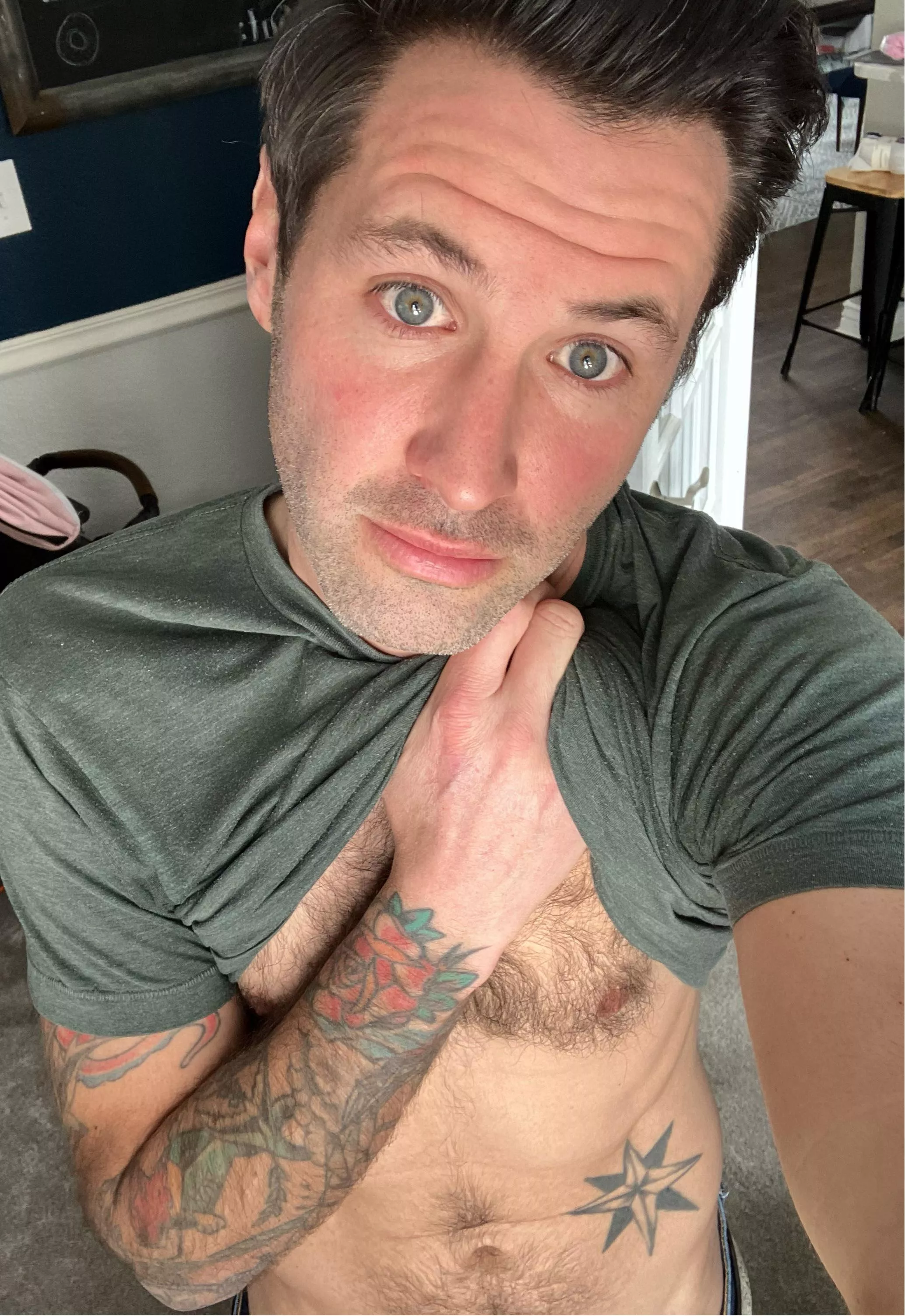 Late 30s tatted dad