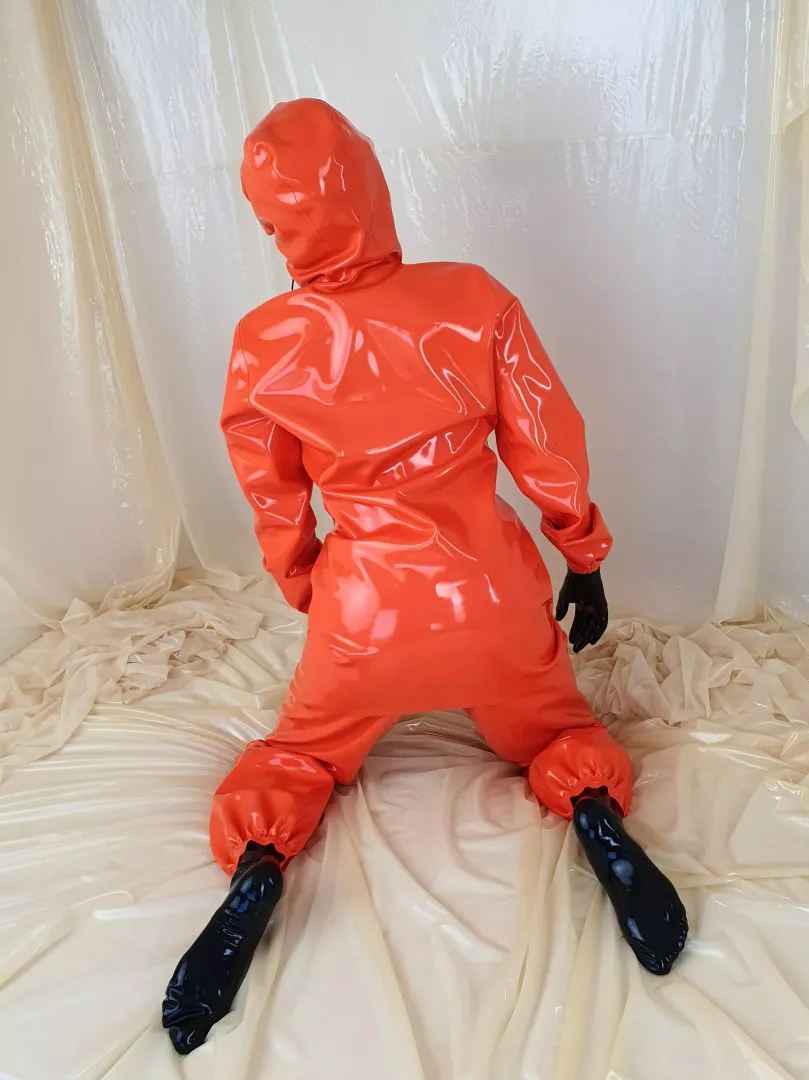 Layers! Heavy raingear over catsuit! 