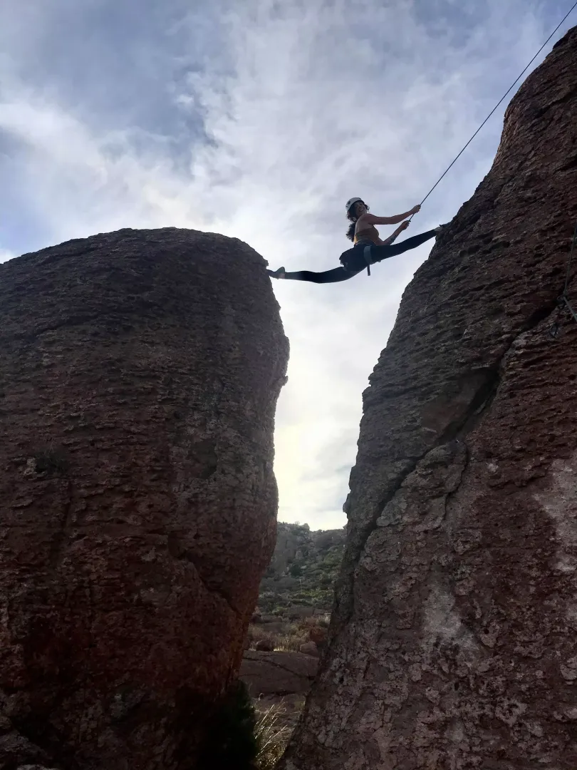 Love combining my flexibility with rock climbing 🤍
