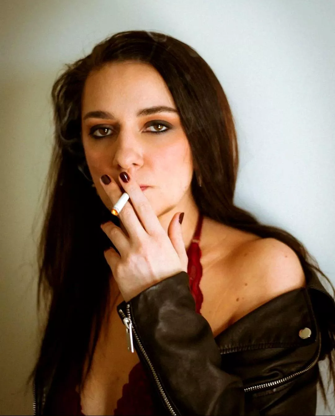 Lovely brunette girl smoking