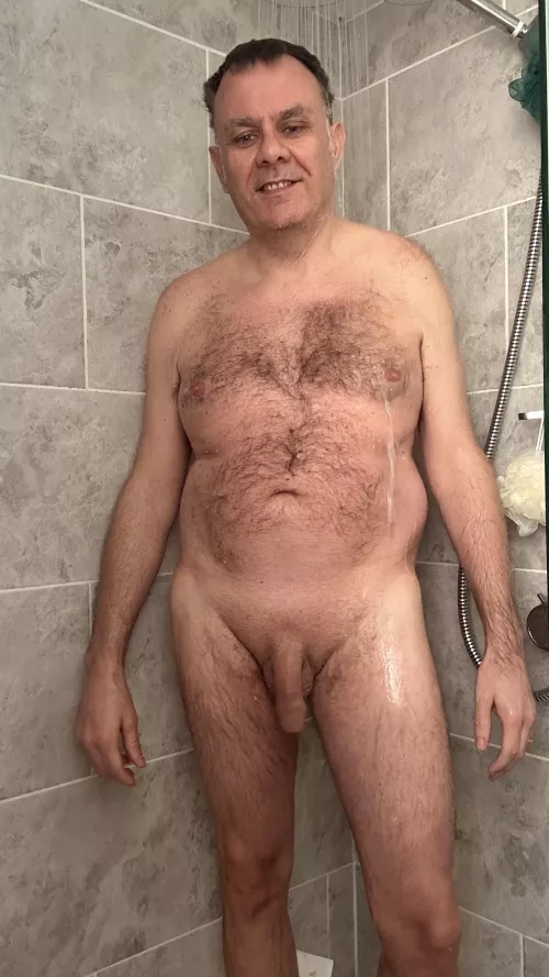Mature guy in a shower