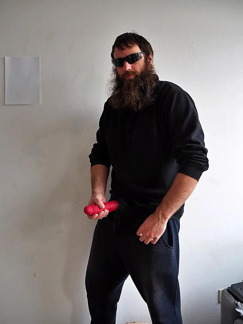 Me, while I'm holding a big red dildo in front of myself