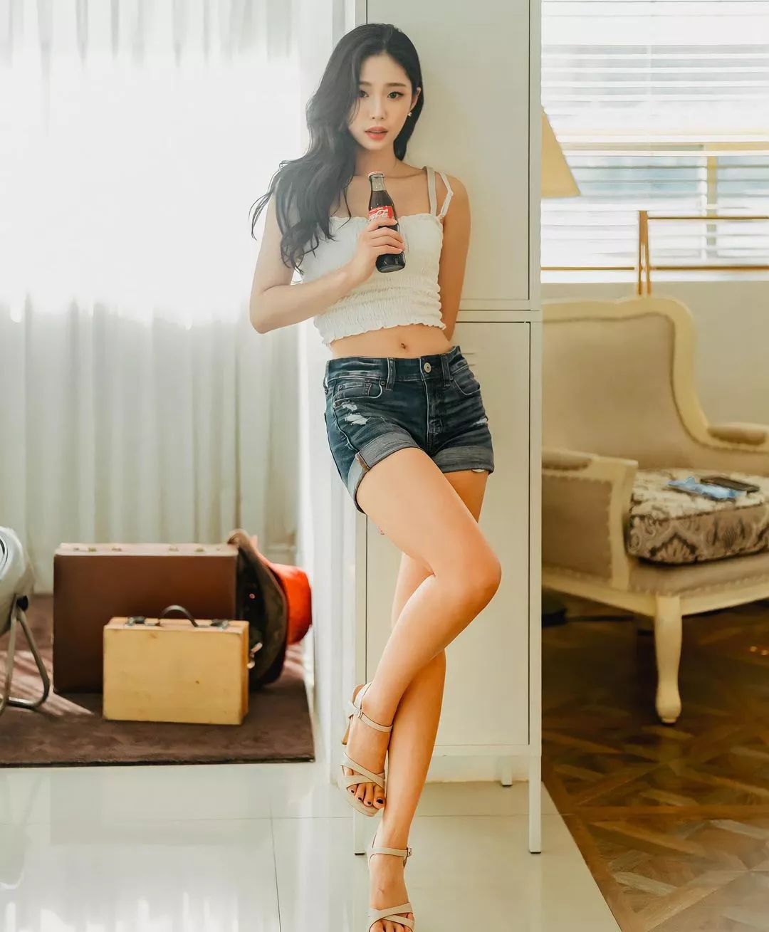 Midriff and denim shorts