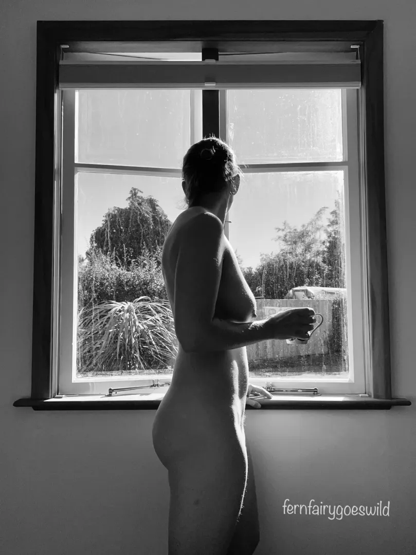 MILF enjoying that morning coffee by the window