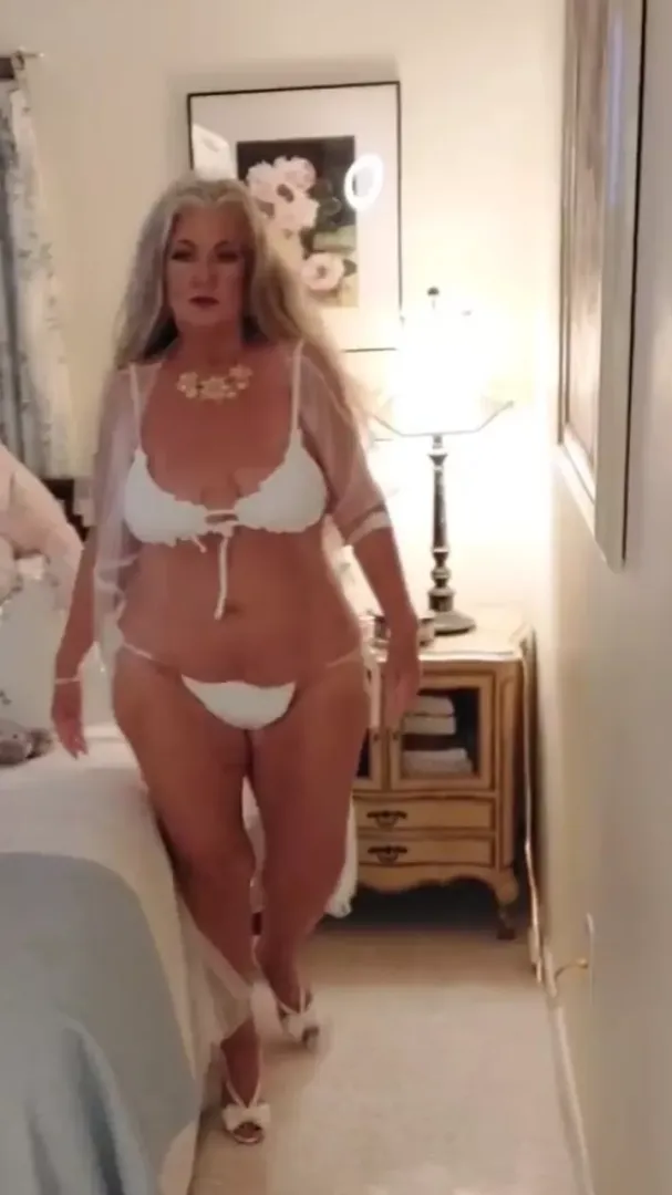 Modeling a white bikini