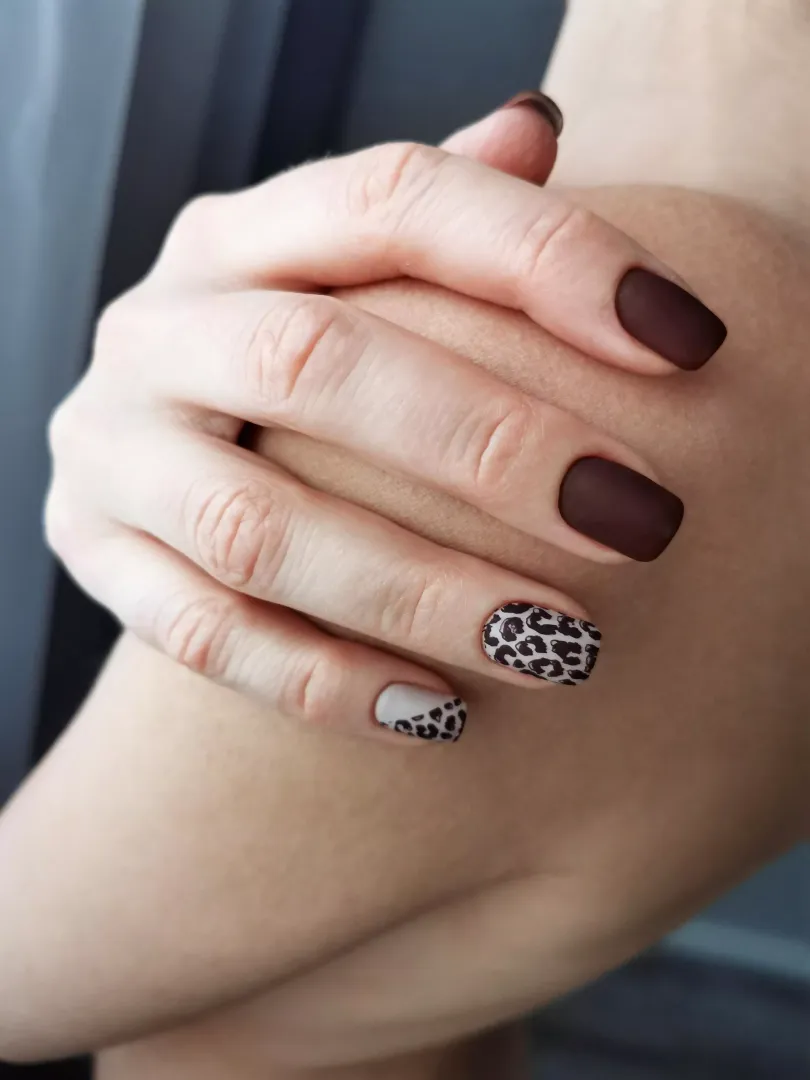 My hand with a new manicure on my bare shoulder. What do you think of this?