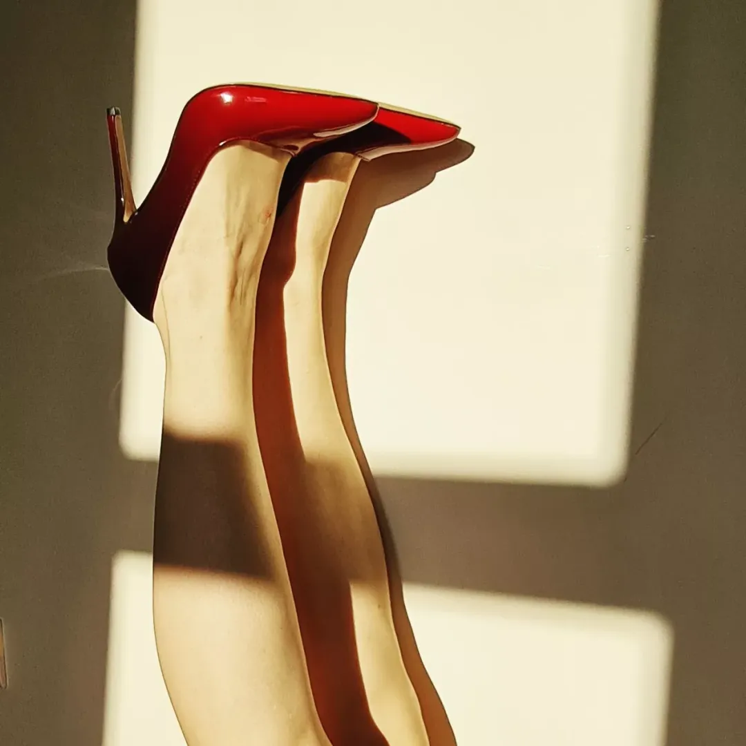My high heels. Better with black or red dress?