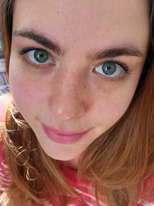 My new camera really shows off my freckle face. =D