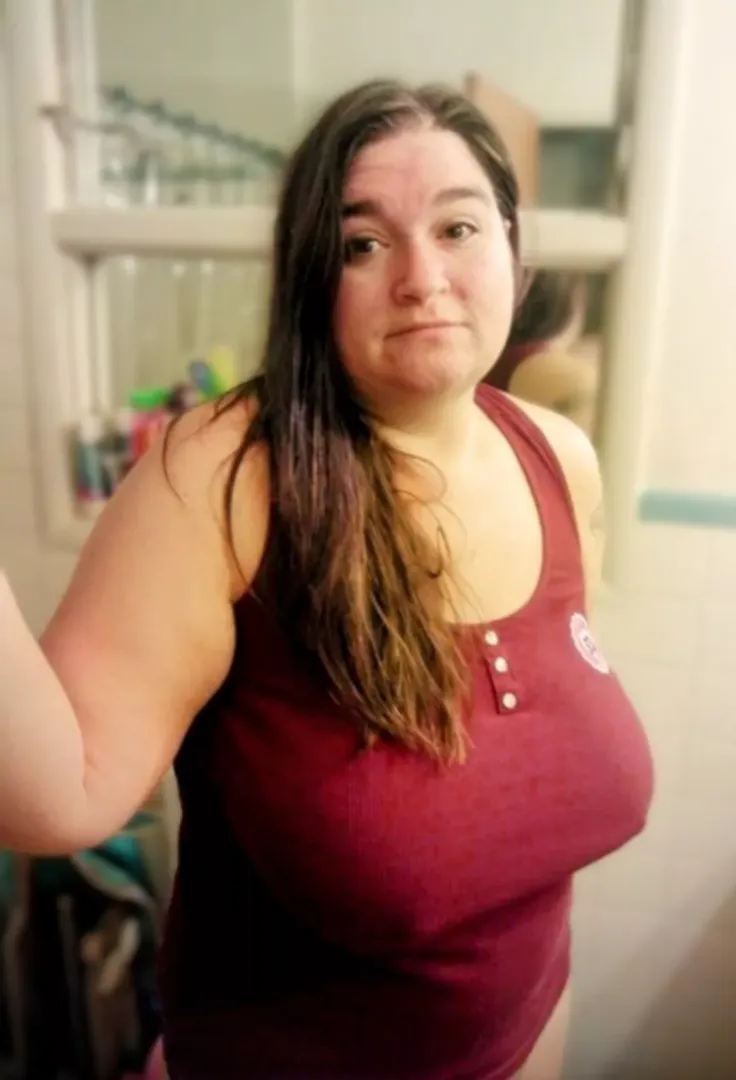 My wife in her dark red tank .